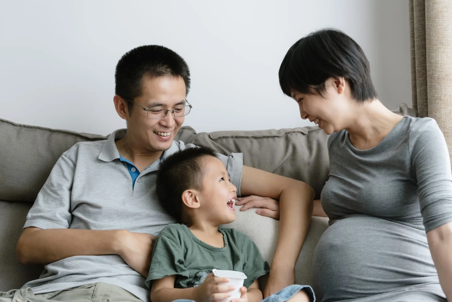 Pregnant family with child