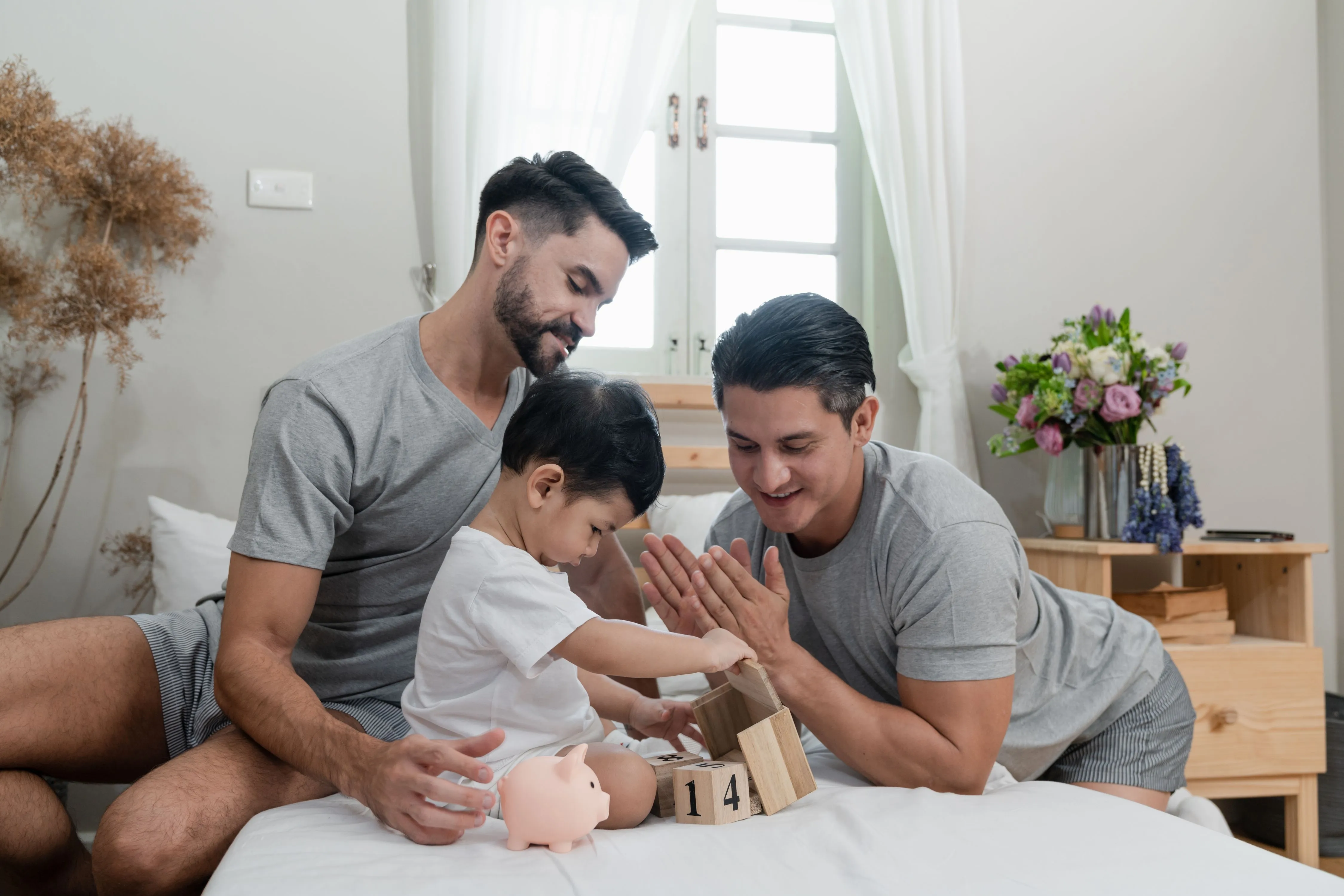 Fathers playing with child